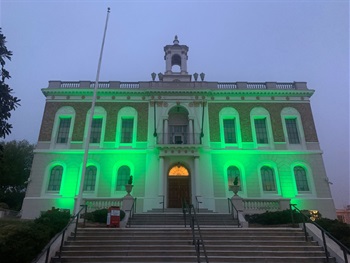 City Hall at night with green uplighting